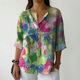 Gabriela | Cvjetna Bluza u Vibrantnim Bojama sa Dugmetom