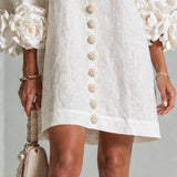 Vestido Mini Floral com Botões e Punhos Florais Marcantes